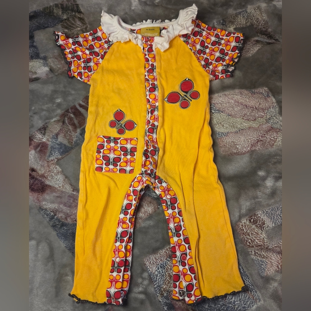 Vibrant Yellow Kids Footie with Multicolored Patterns